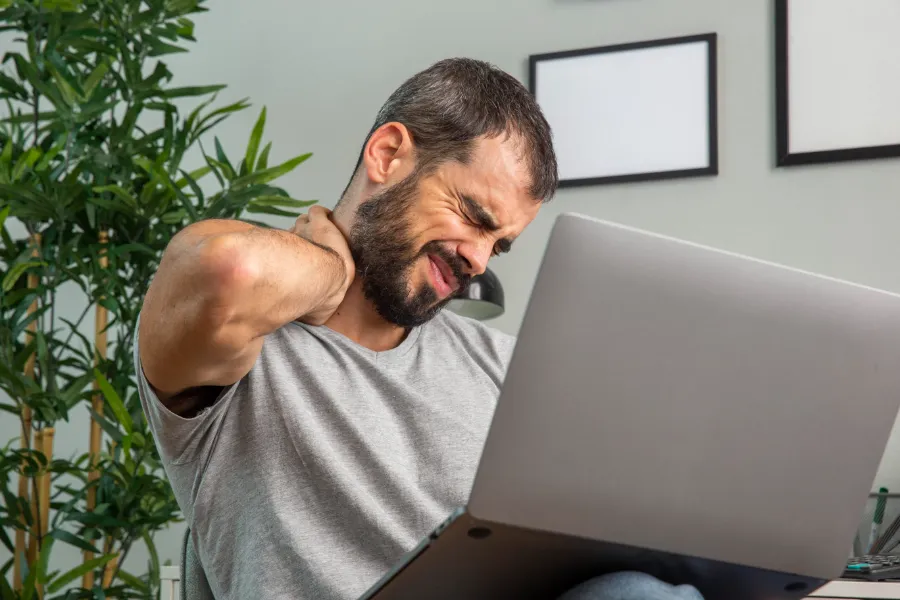 image of a man experiencing neck pain